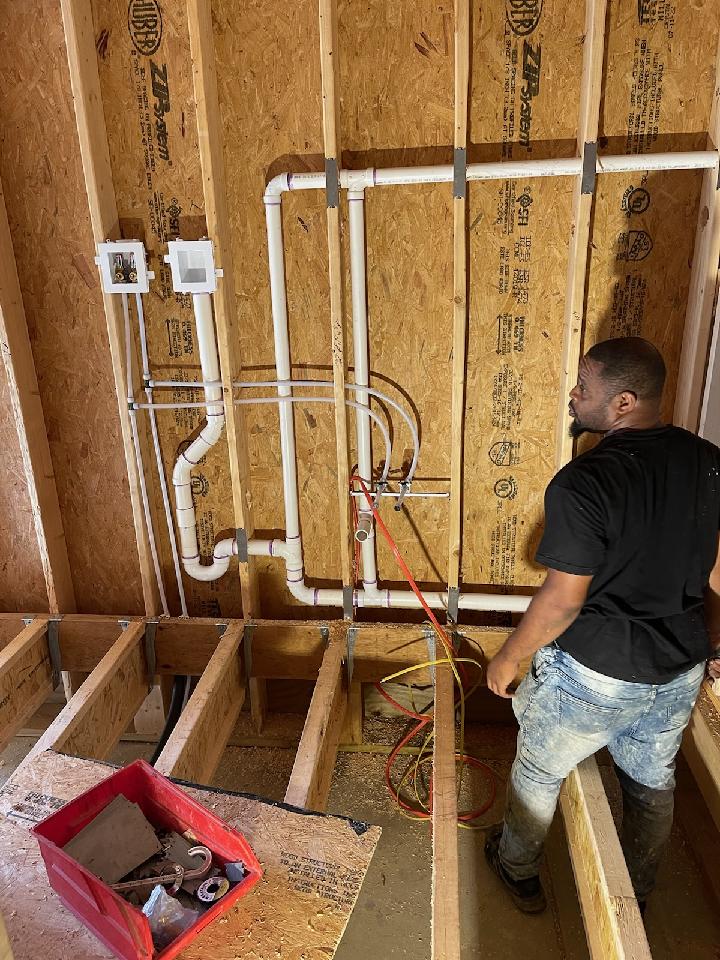 Licensed WSSC plumber in Gaithersburg, MD performing professional plumbing services, including backflow testing, repairs, and installations, ensuring compliance with WSSC regulations."